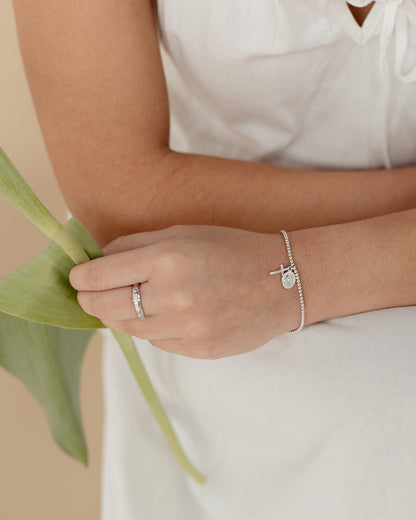 Anillo Decenario delgado con circonitas